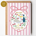Precious Days Gifts pink striped baby card with stork, gold foil lettering "Welcome Little One", and floral accents.