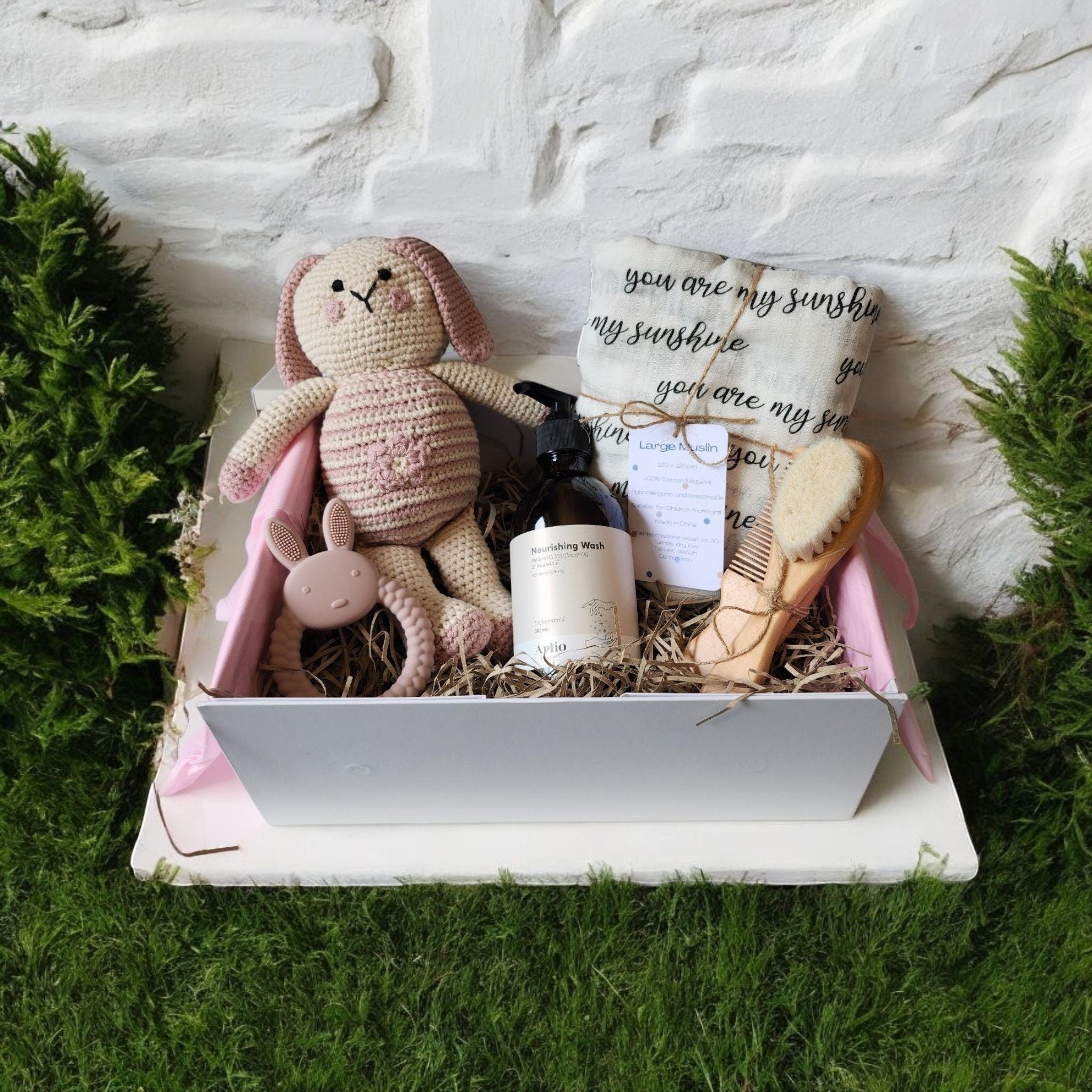 Precious Days Gifts new baby gift box with crochet bunny, muslin, teether, bamboo brush & comb, and wash.