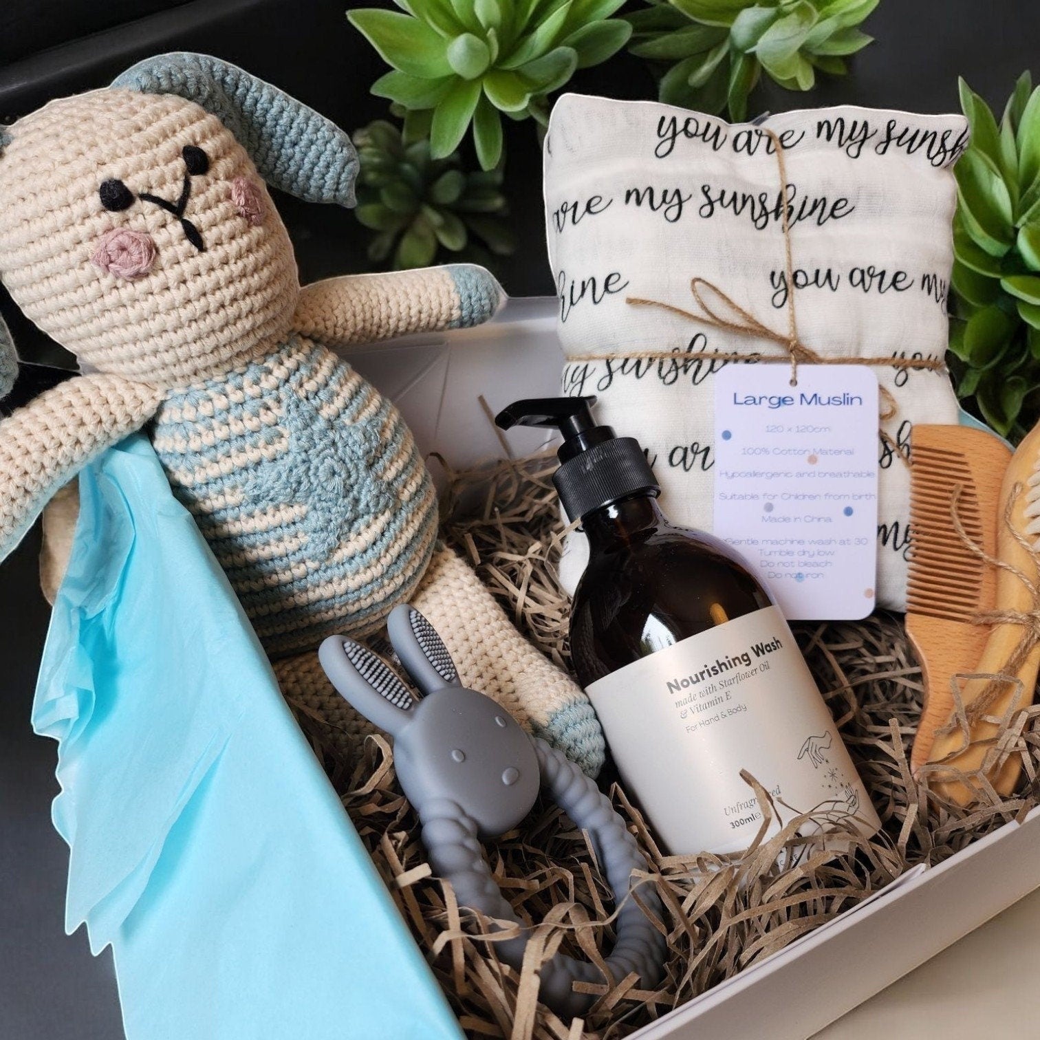 Precious Days Gifts new baby gift box with crochet bunny, muslin, teether, wash, and bamboo brush set.