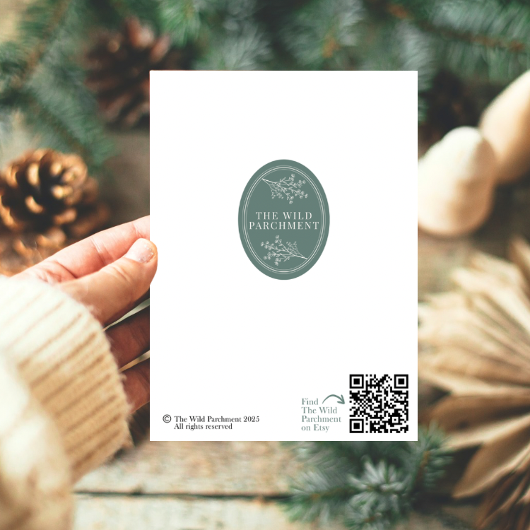 Precious Days Gifts A6 first Christmas card back view with brand logo and QR code held in a hand