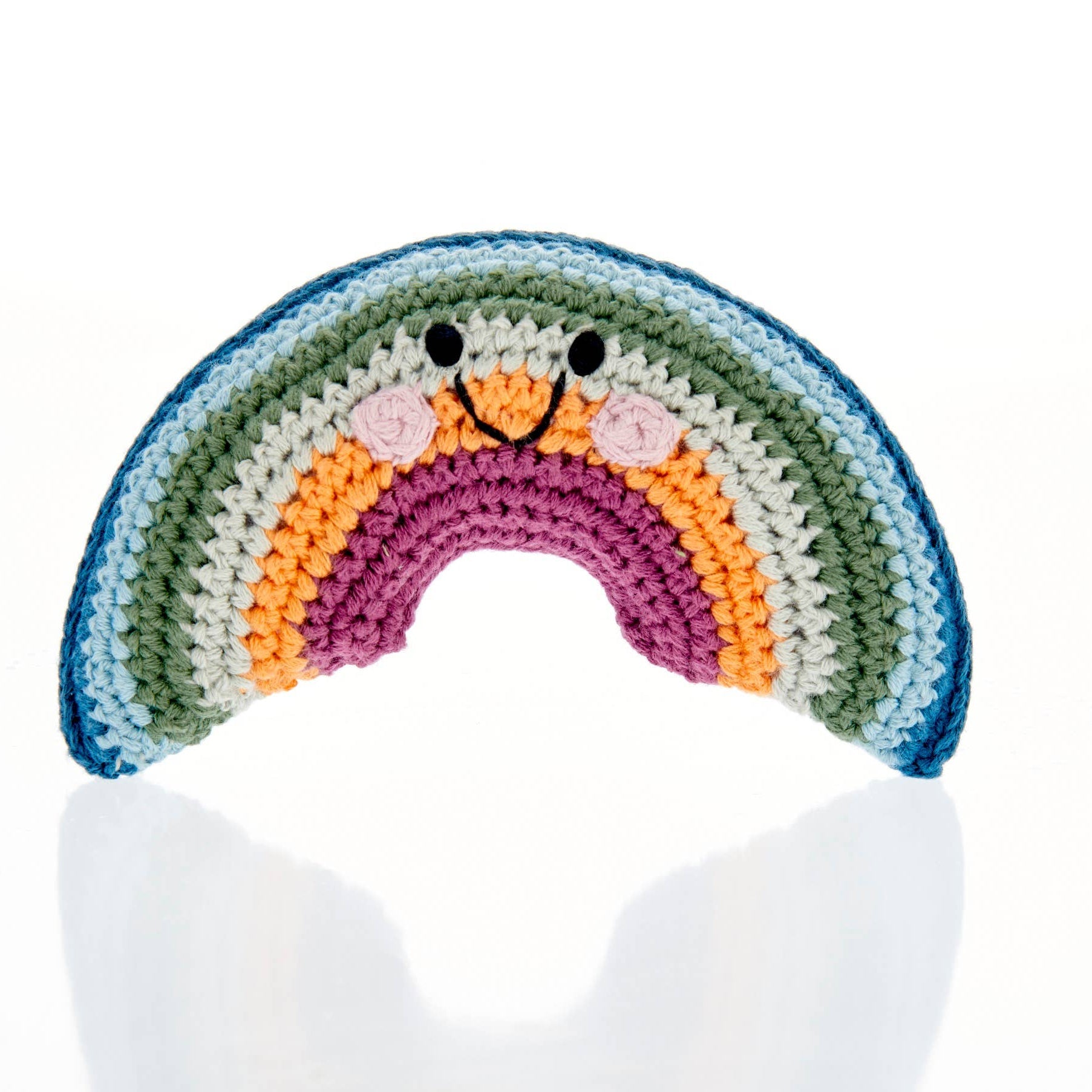 Precious Days Gifts handmade crochet rainbow baby rattle in muted tones with a smiling face for sensory play.