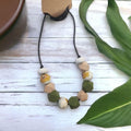 Precious Days Gifts handmade garden-themed teething necklace with silicone, wood, and floral beads.