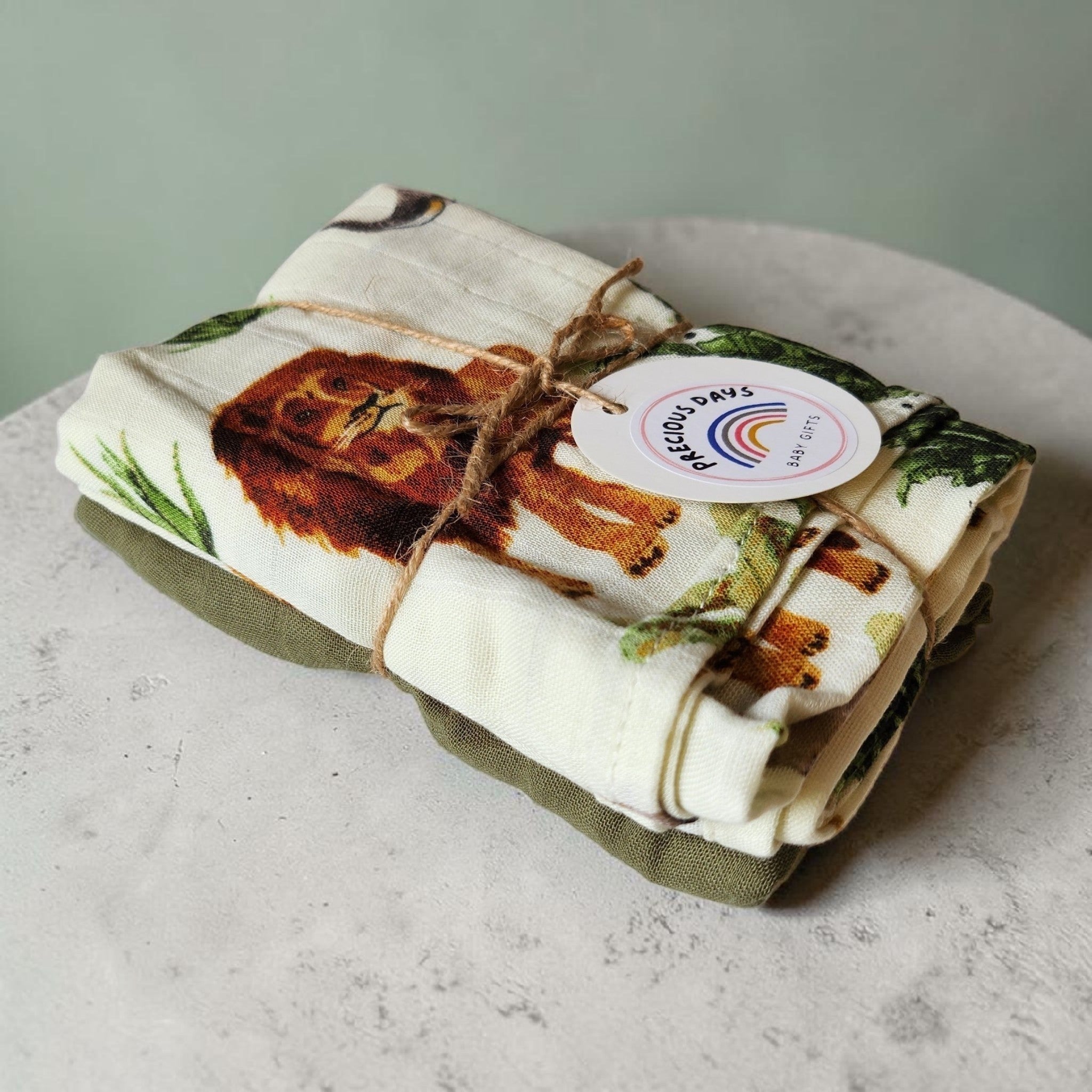 Precious Days Gifts Muslin Duo Gift Set with safari animal print and solid olive green. 60x60cm.