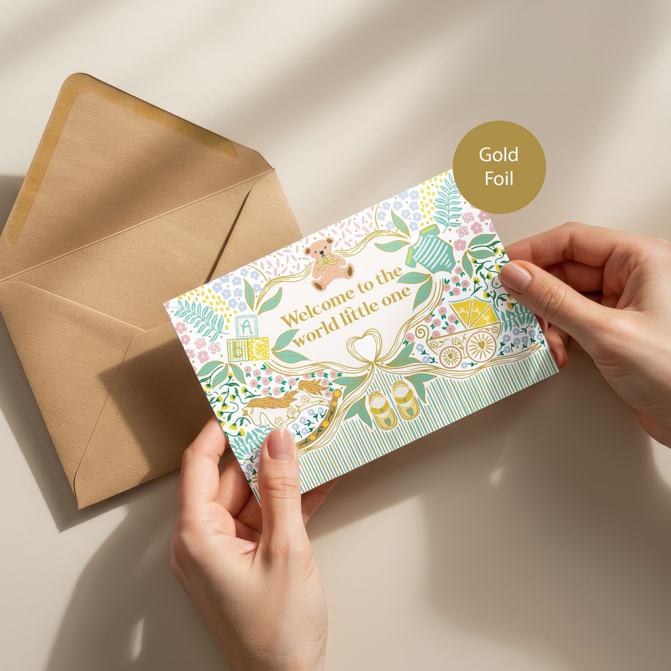 Precious Days Gifts new baby card with gold foil lettering "Welcome to the world little one", floral and baby motifs.