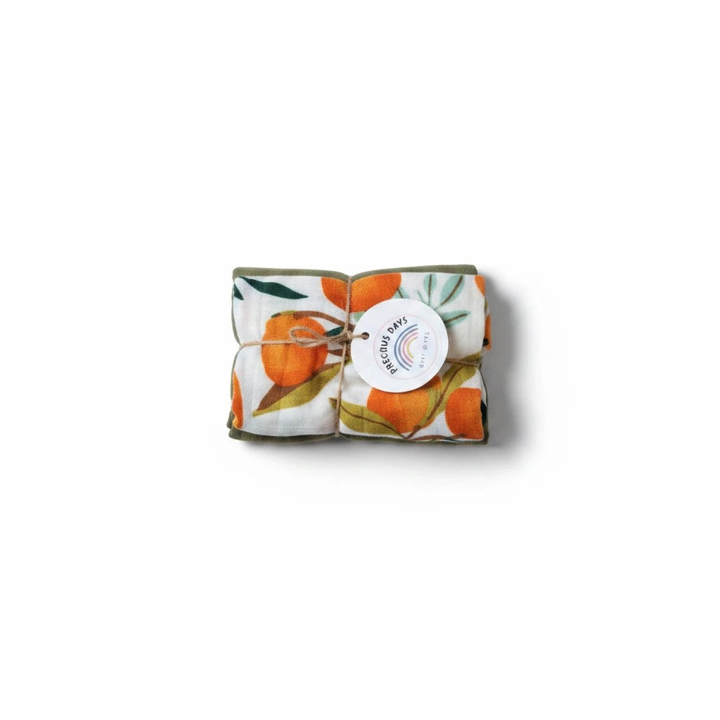 Precious Days Gifts baby muslin swaddle set with orange print and green trim. 60 x 60cm.