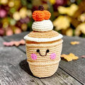 Precious Days Gifts handmade crochet pumpkin spice latte rattle with a smiling face and orange pumpkin topper.