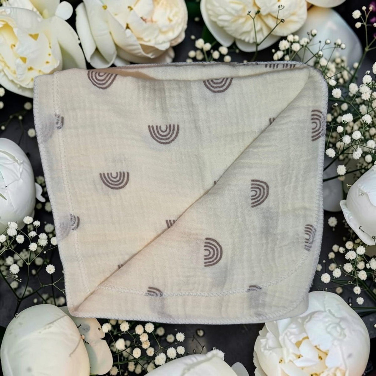 Precious Days Gifts cream cotton muslin square with brown rainbow pattern surrounded by white flowers