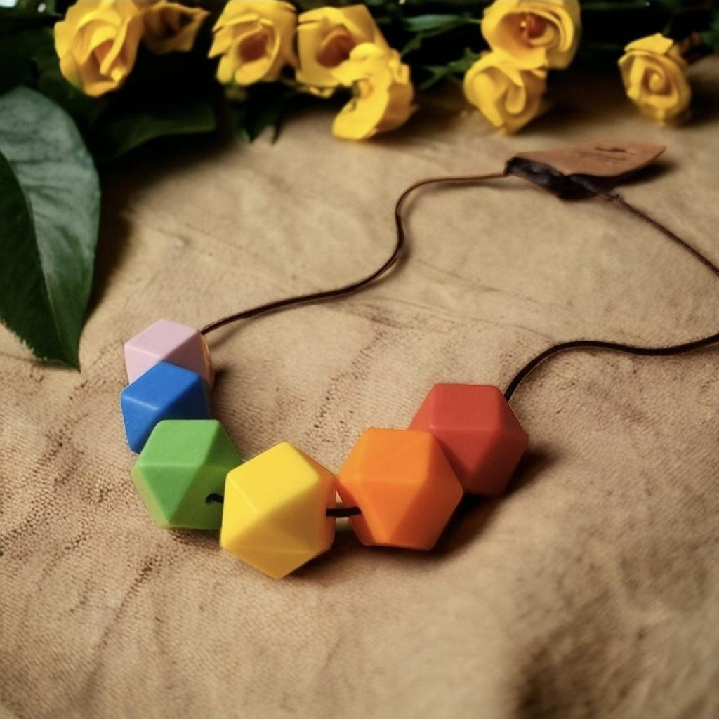 Precious Days Gifts rainbow silicone teething necklace for babies, BPA-free, food-grade beads.