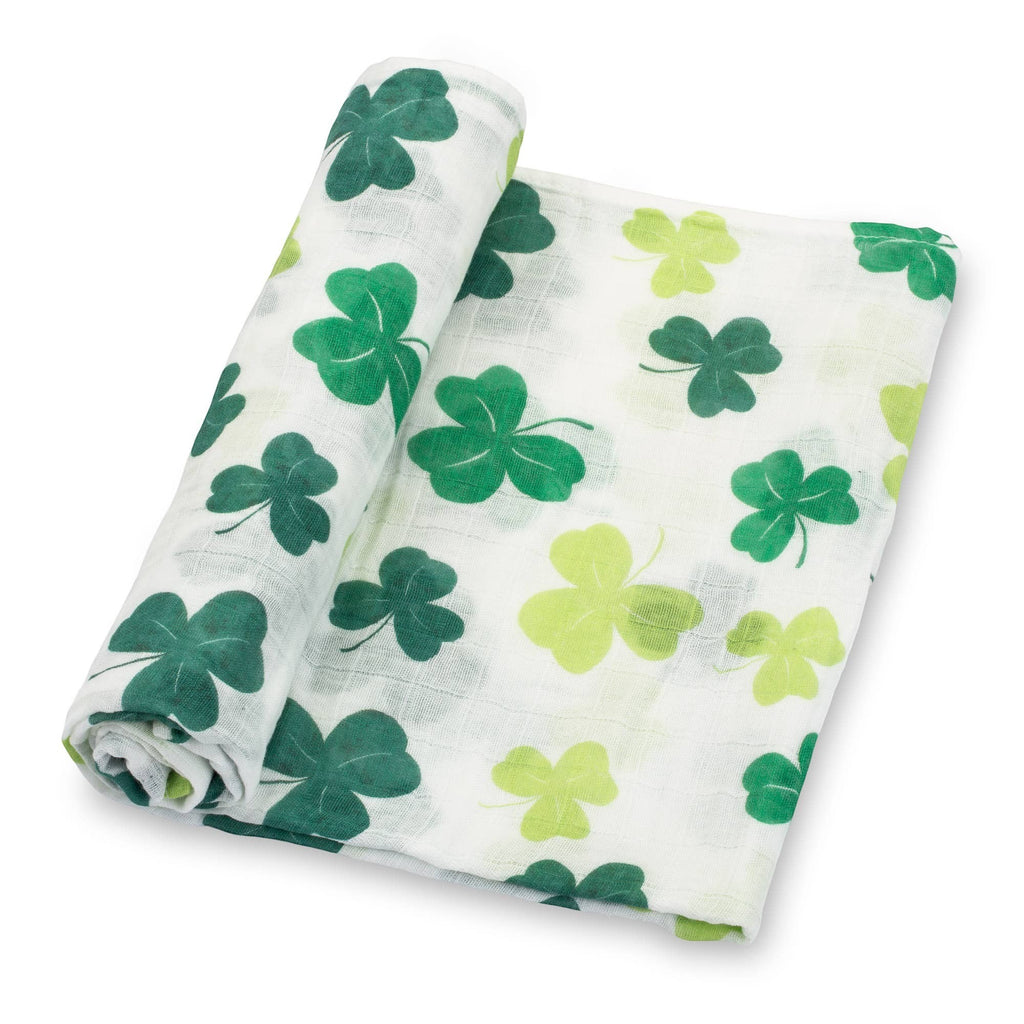 Precious Days Gifts baby muslin swaddle blanket in white with a green shamrock print. 100% cotton, 120x120cm.