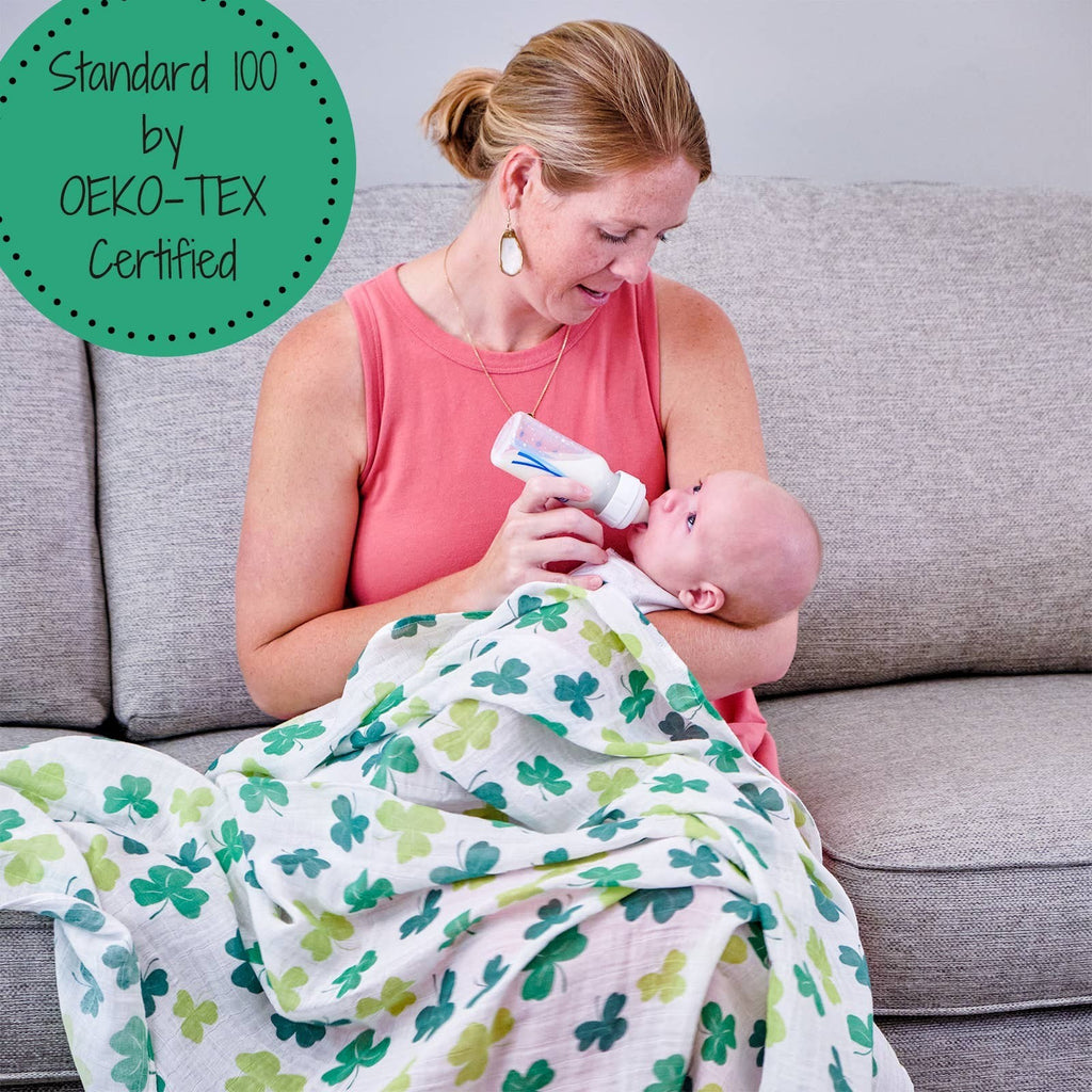 Precious Days Gifts white 100% cotton muslin swaddle blanket with green shamrock print, 120x120cm.