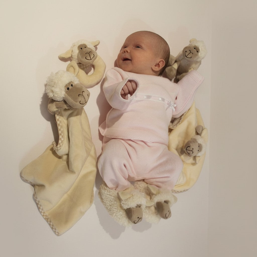 Precious Days Gifts pink plush sheep baby slippers, 0-6 months. Soft, cosy, and machine washable.
