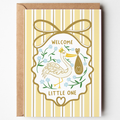 Precious Days Gifts yellow striped new baby card with a stork illustration and gold Welcome Little One lettering.